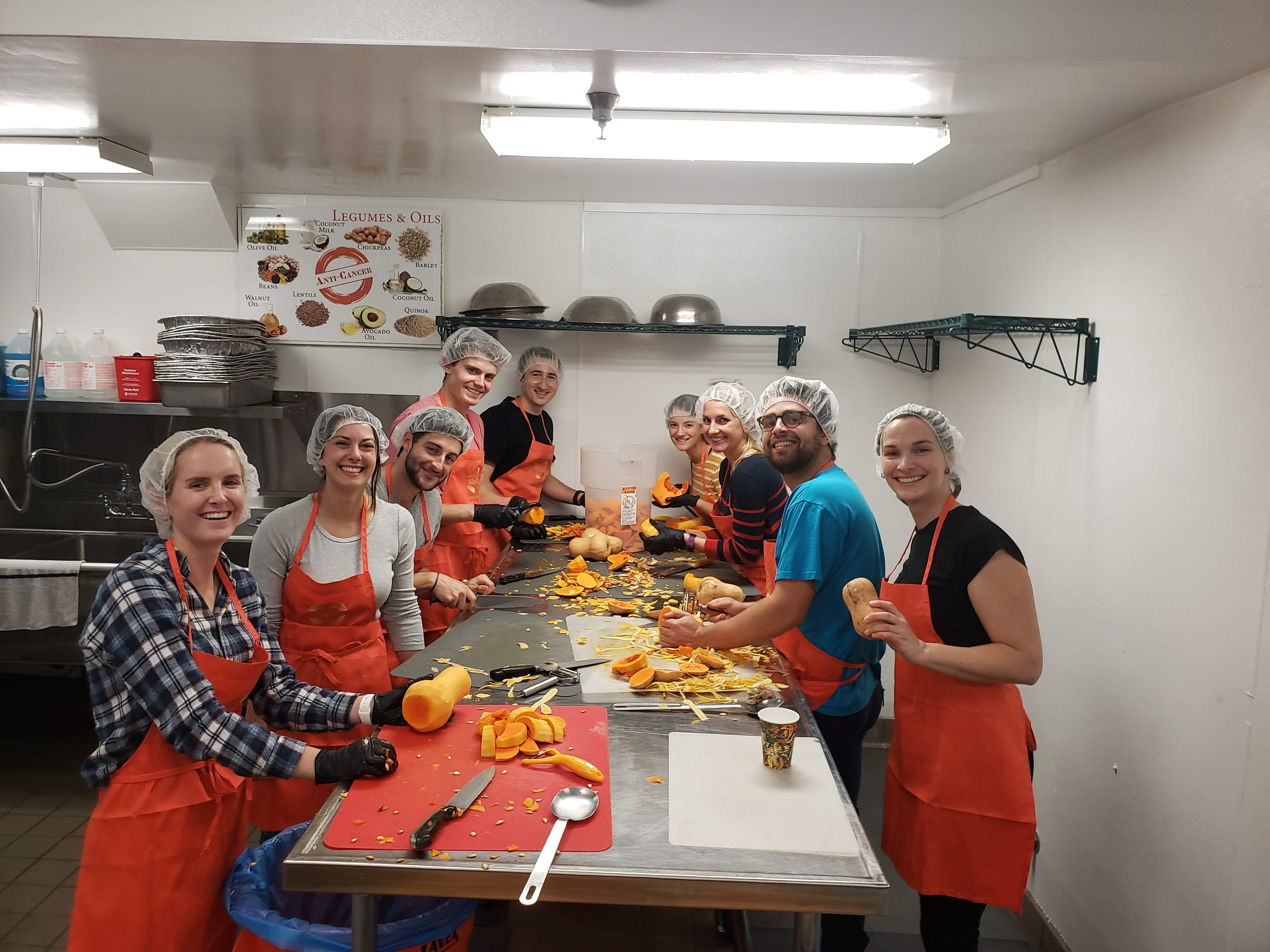 Volunteers preparing vegetables in the Organic Soup Kitchen