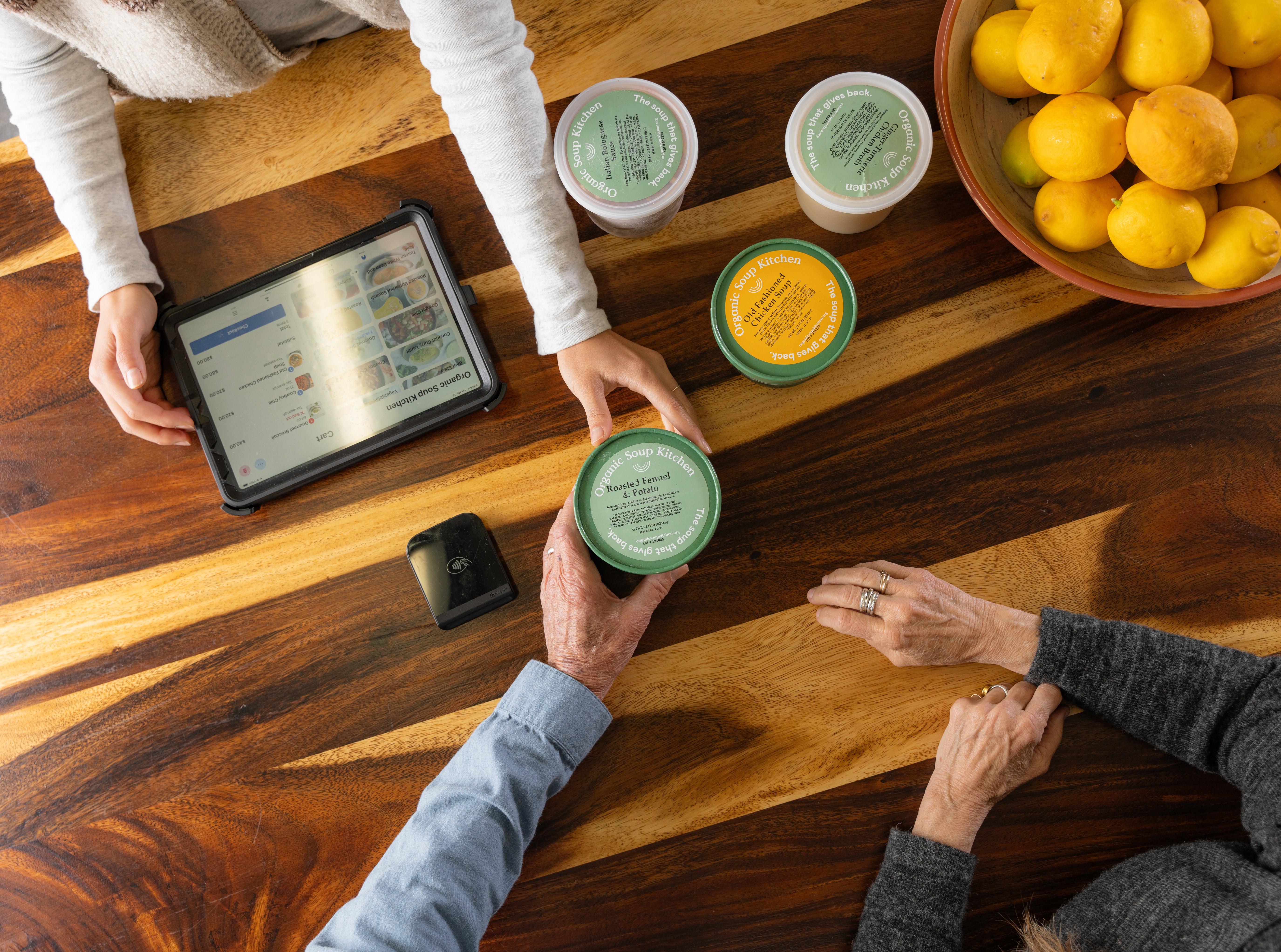 Organic Soup Kitchen SoupMeals being purchased at a counter